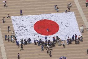 Huge Japanese flag displayed at Saitama stadium